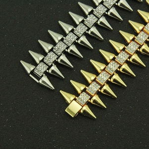 Bracelets hip hop punk avec clous coniques dorés et argentés et strass étincelants