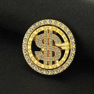 Rotating dollar sign phone accessory with sparkling rhinestones and gold-tone finish