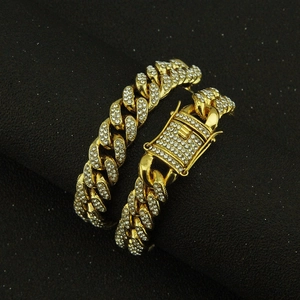Iced out Cuban link bracelet for men with paved rhinestones in classic gold finish