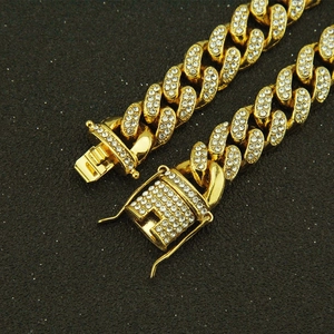Iced out gold plated Cuban link chain bracelet with micro paved cubic zirconia diamonds