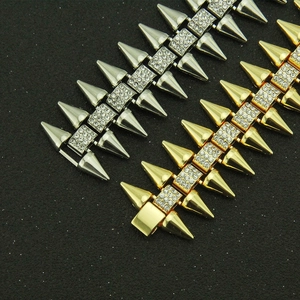 Bracelet hip-hop pour homme avec strass et pointes en finitions dorée et argentée