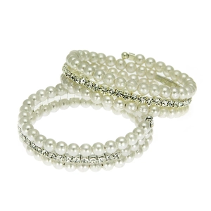 Detail of multi-layer pearl and rhinestone spiral bracelet with silver setting