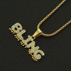 Collier hip-hop doré avec pendentif BLING serti de cristaux et effet goutte d'eau