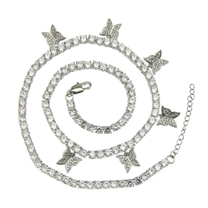 Detailed view of silver tennis chain necklace with zircon butterfly pendants and lobster clasp