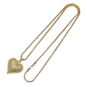 Golden rolo chain necklace featuring a heart-shaped pendant paved with sparkling rhinestones