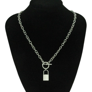 Detail of silver padlock pendant necklace with vertical stripes and OT toggle clasp