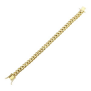 Détail du bracelet gourmette doré 8mm serti de zircons avec fermoir à rabat sécurisé