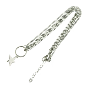 Minimalist silver triple-layered stainless steel necklace featuring a star pendant