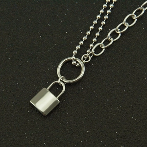 Minimalist double-layer silver chain necklace featuring a polished square lock pendant