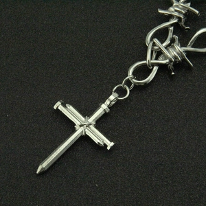 Silver 3D cross pendant necklace with barbed wire chain design in minimalist industrial style