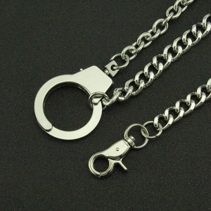 Punk style silver metal pant chain featuring a handcuff charm and lobster clasp for streetwear