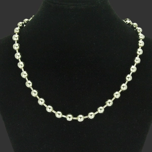 Classic silver metal ball chain necklace displayed on a black neck bust stand