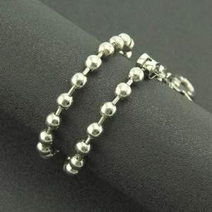 Minimalist silver bead chain necklace in stainless steel with a sleek industrial design