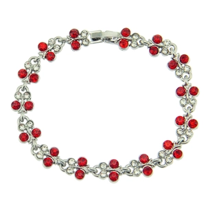 Detailed macro view of cherry-shaped bracelet with red and white crystal rhinestones