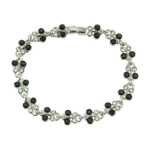 Detail of silver clover bracelet featuring alternating black stones and clear crystals