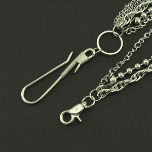 Three-layer silver punk wallet chain with carabiner and O-ring on textured background