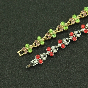Elegant floral rhinestone bracelets in gold-green and silver-red crystals with clasps