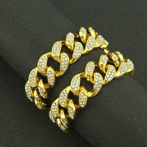 20mm gold Cuban link chain for men featuring heavy iced-out pave rhinestones