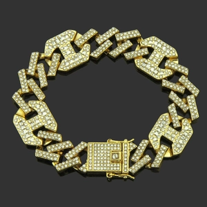 Golden hip hop Cuban link bracelet with iced out crystals and geometric hollow design