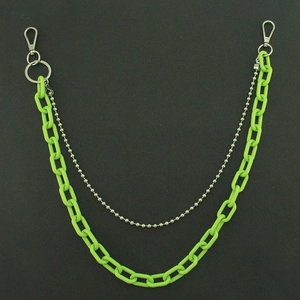 Close-up of dual-layer hip hop waist chain with neon green acrylic and silver beads