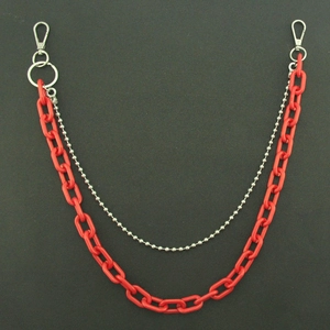 Detail of red acrylic chunky chain and silver ball chain with dual lobster clasps