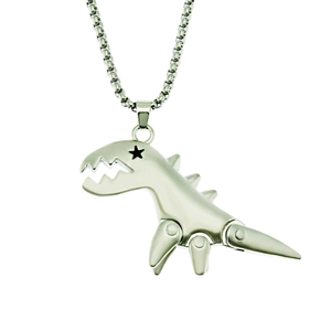 Gros plan du pendentif dinosaure argenté avec découpe étoile sur une chaîne à billes