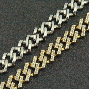 Detailed comparison of textured silver and iced out gold 15mm cuban link chains