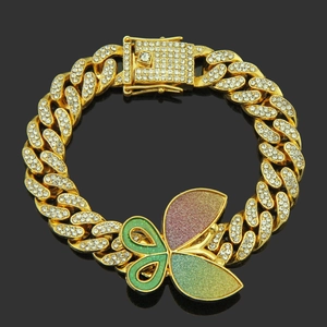 Hip hop Cuban link bracelet with glitter butterfly charm and crystals on black background