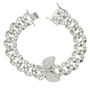 Macro detail of iced-out Cuban link bracelet with butterfly motif and zircon pavé
