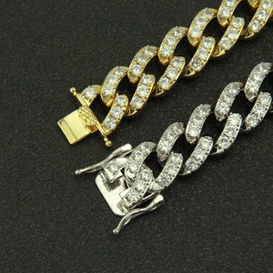 Iced out Cuban link bracelets in gold and silver finish with butterfly zircon accents