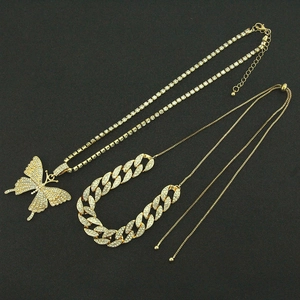 Parure hip hop avec collier tennis pendentif papillon doré et chaîne cubaine sertie de strass