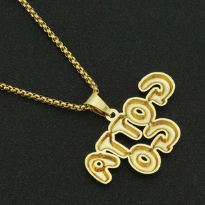 Detailed close-up of iced-out gold 1993 number pendant with durable box chain necklace