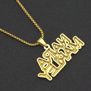 Detailed close-up of golden AVIANI letter pendant with iced-out pave stones on cuban chain