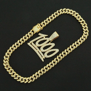 Detailed view of gold plated iced out cuban link chain with number 100 pendant