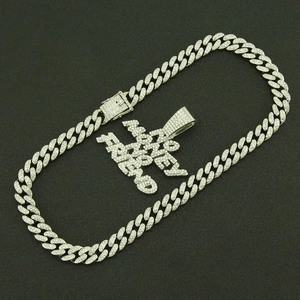 Iced-out Money Over Friend pendant on a silver-plated Cuban link chain for hip-hop style