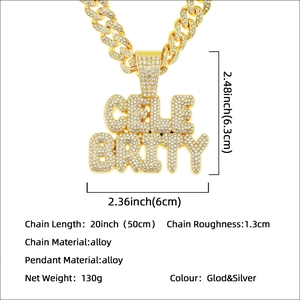 Hip hop celebrity letter pendant with iced out rhinestones on a gold Cuban chain
