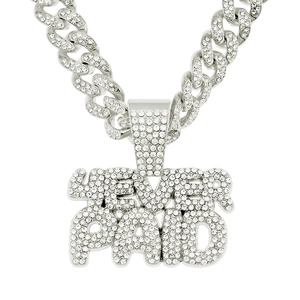 Close-up of hip hop Cuban chain with 4EVER PAID pendant encrusted with white crystals