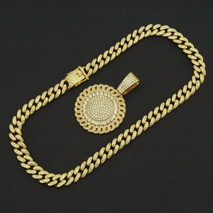 Detail of hip-hop golden Cuban link chain with a layered iced-out sunflower pendant