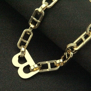 Gold chunky chain necklace with industrial rectangle links and polished letter B pendant