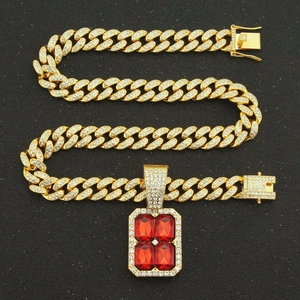 Hip-hop gold Cuban link necklace with large ruby pendant and white zircon pavé setting