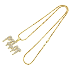 Men's hip hop gold box chain necklace with a drip style RICH letter pendant iced out in crystals