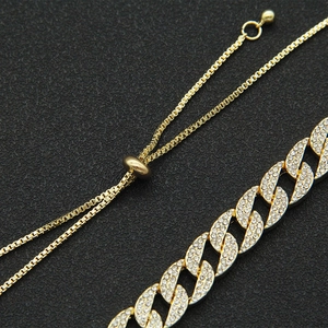 Adjustable gold Cuban link bracelet with sparkling rhinestones and slider clasp