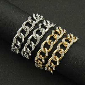 Iced out Cuban link bracelets in gold and silver finish with sparkling rhinestones