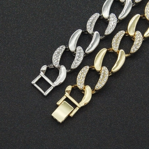 Hip-hop style Cuban link bracelet in gold and silver finish with crystal rhinestones