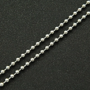 Macro detail of polished stainless steel ball chains for double layered necklaces