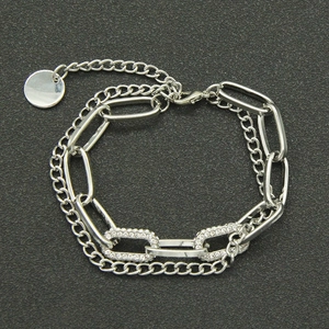 Zweilagiges silbernes kubanisches Kettenarmband mit Zirkonia-Ovalgliedern und rundem Anhänger