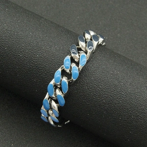 Cuban link ring in silver metal with light and dark blue enamel drip finish