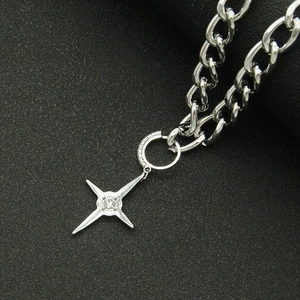 Silver cuban chain necklace with a sparkling four-pointed star pendant and crystal inlay