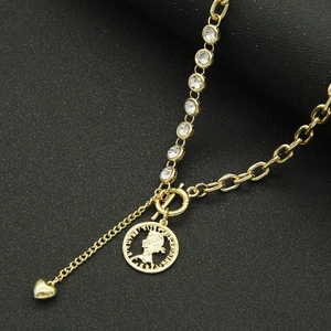 Asymmetric gold coin necklace with cubic zirconia chain and OT toggle clasp