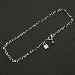 Chunky titanium steel chain necklace featuring a padlock pendant and OT buckle clasp
